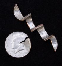 The Ultimate Bent, Torn & Mutilated Coin