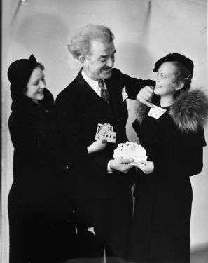 Blackstone Publicity Photograph with Assistants and Cards